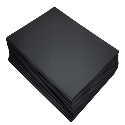 Stack of black card sheets on a white background