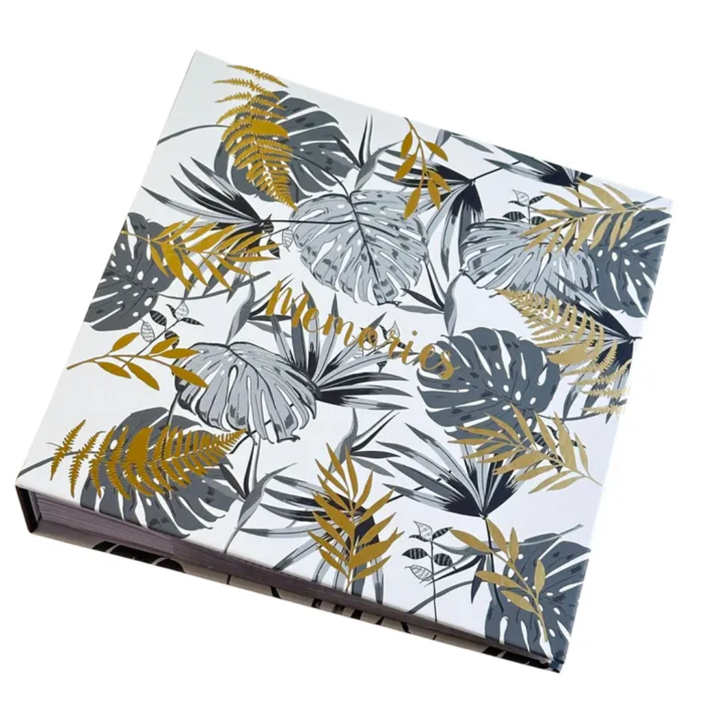 photo album with tropical leaf pattern on a white background