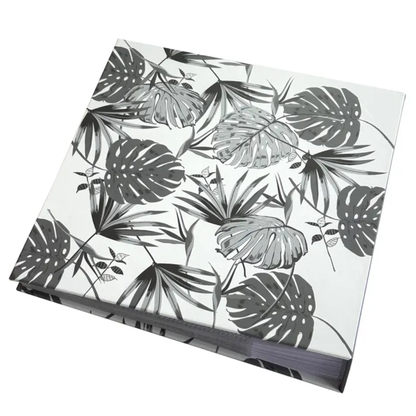 Photobook with grey leaf pattern on a white background