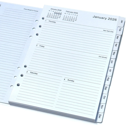 An open spiral-bound planner or calendar organizer showing January 2026, with lined daily sections, a small monthly calendar at the top, and MONTH page tabs along the right edge.