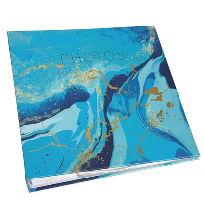 Blue marbled photo album with gold accents on a white background