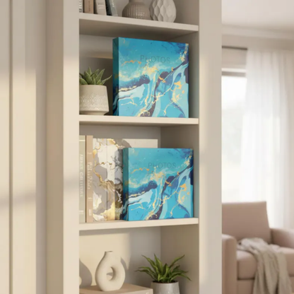 Bookshelf with decorative PHOTO books and plants in a living room setting