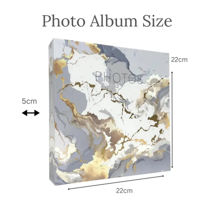 Marble-patterned photo album with dimensions labeled on a white background
