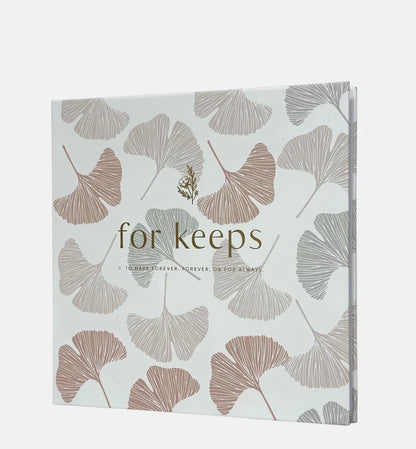 Pink Photo book with leaf pattern and 'for keeps' text on a white background
