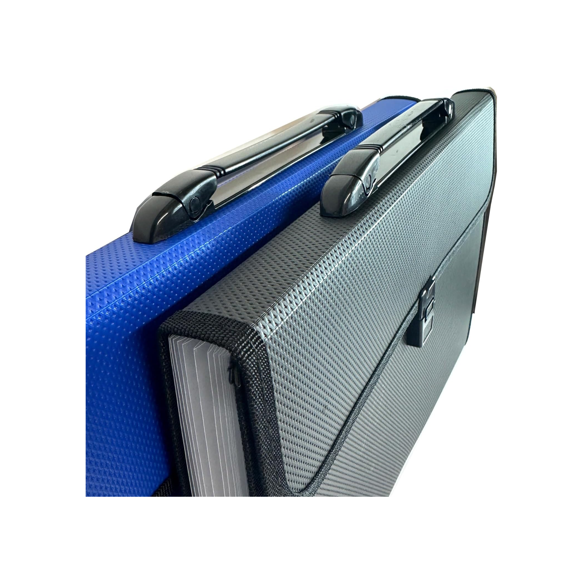 A close-up of a black briefcase with a carbon-fiber-look textured front flap and black handles, partially layered over a blue briefcase on a plain white background.