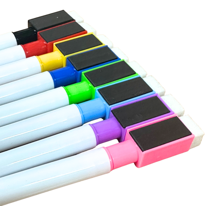 Set of markers with colorful caps on a white background