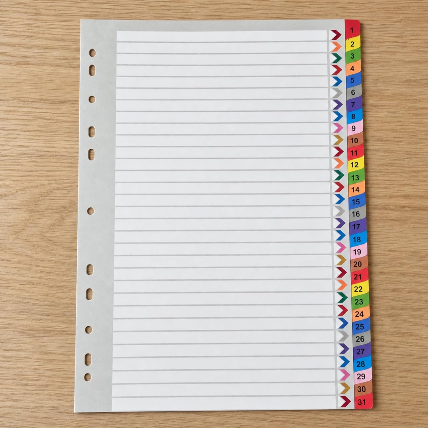 A4 index dividers pack with colourful tabs numbered 1 to 31, shown on a light wood background.